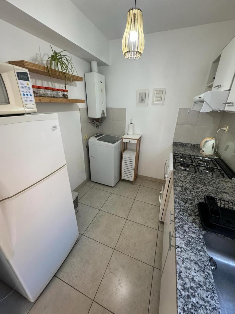 Kitchen or kitchenette, microwave, washing machine