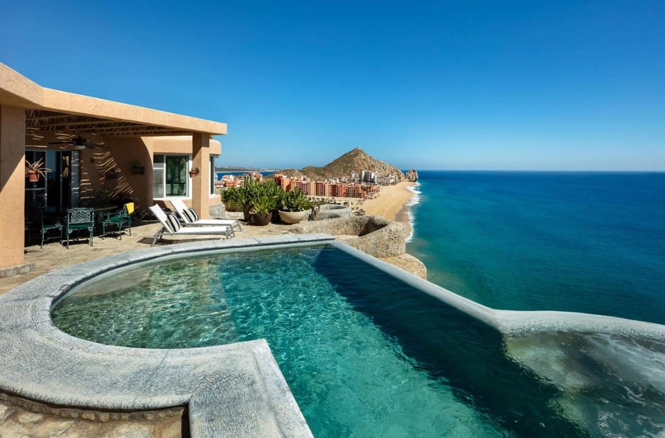 Property building, Patio, Nearby landmark, Natural landscape, Sea view, Swimming pool