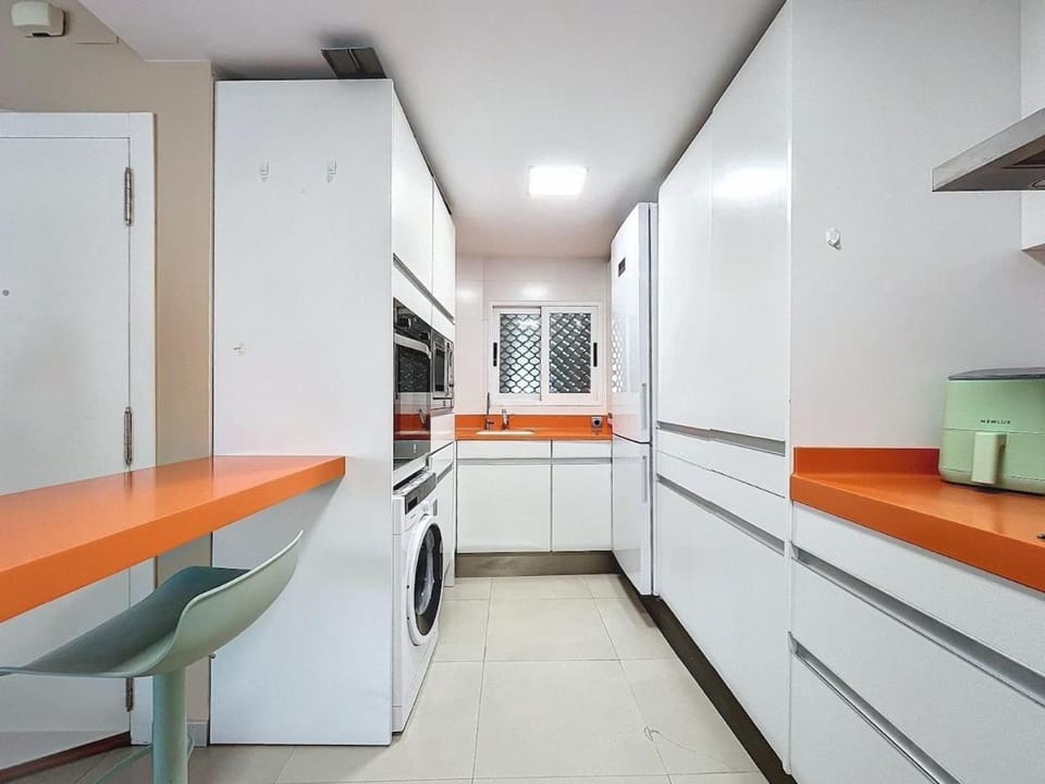 Kitchen or kitchenette, dishwasher, oven, stove, washing machine, dryer