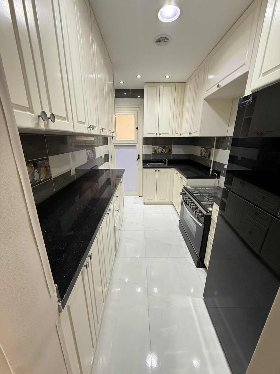 Kitchen or kitchenette, oven, stove