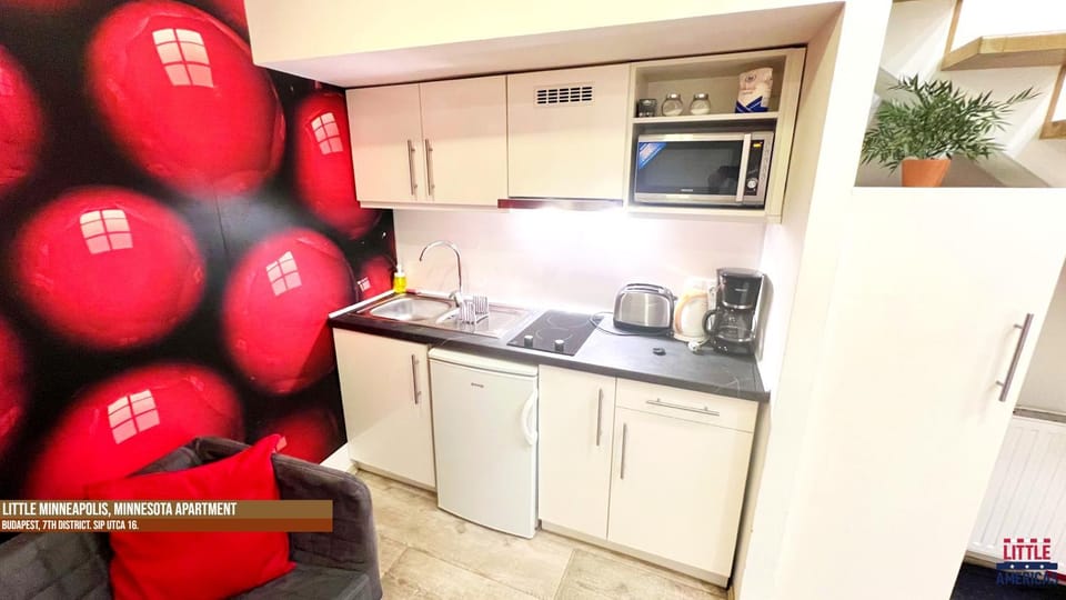 Kitchen or kitchenette, stove, toaster