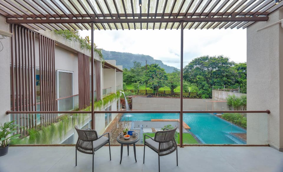 View (from property/room), Balcony/Terrace, Mountain view, Pool view, Swimming pool