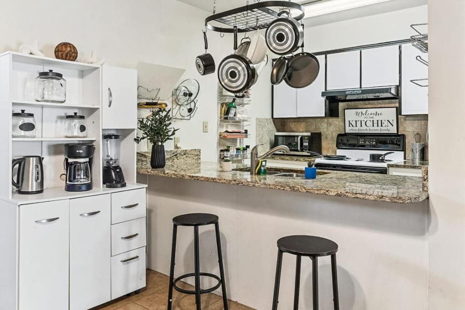 Kitchen or kitchenette, dishwasher, oven, stove, toaster