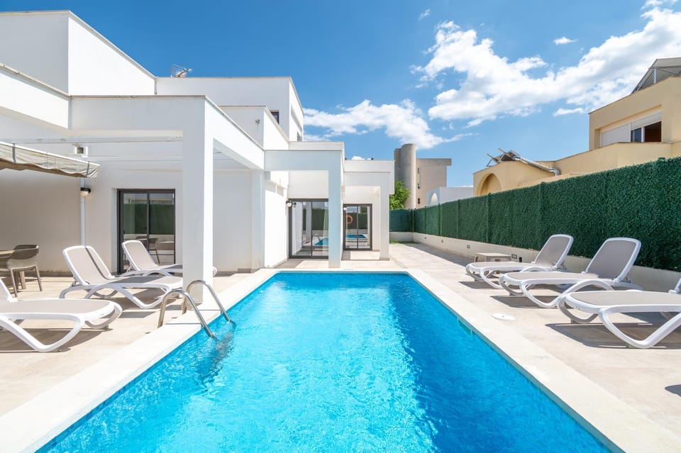 Property building, Living room, Swimming pool