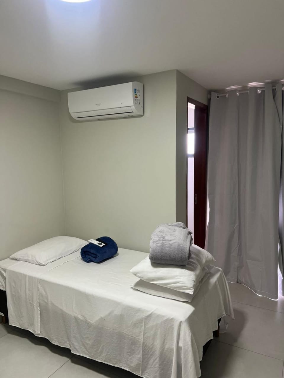 Bed, Photo of the whole room, Bedroom, towels, air conditioner