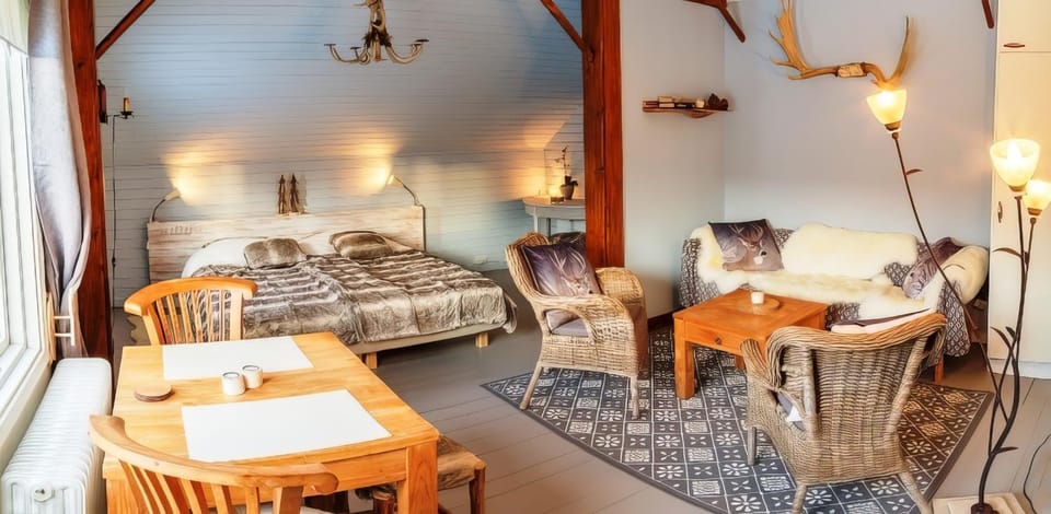 Bed, Living room, Seating area, Bedroom