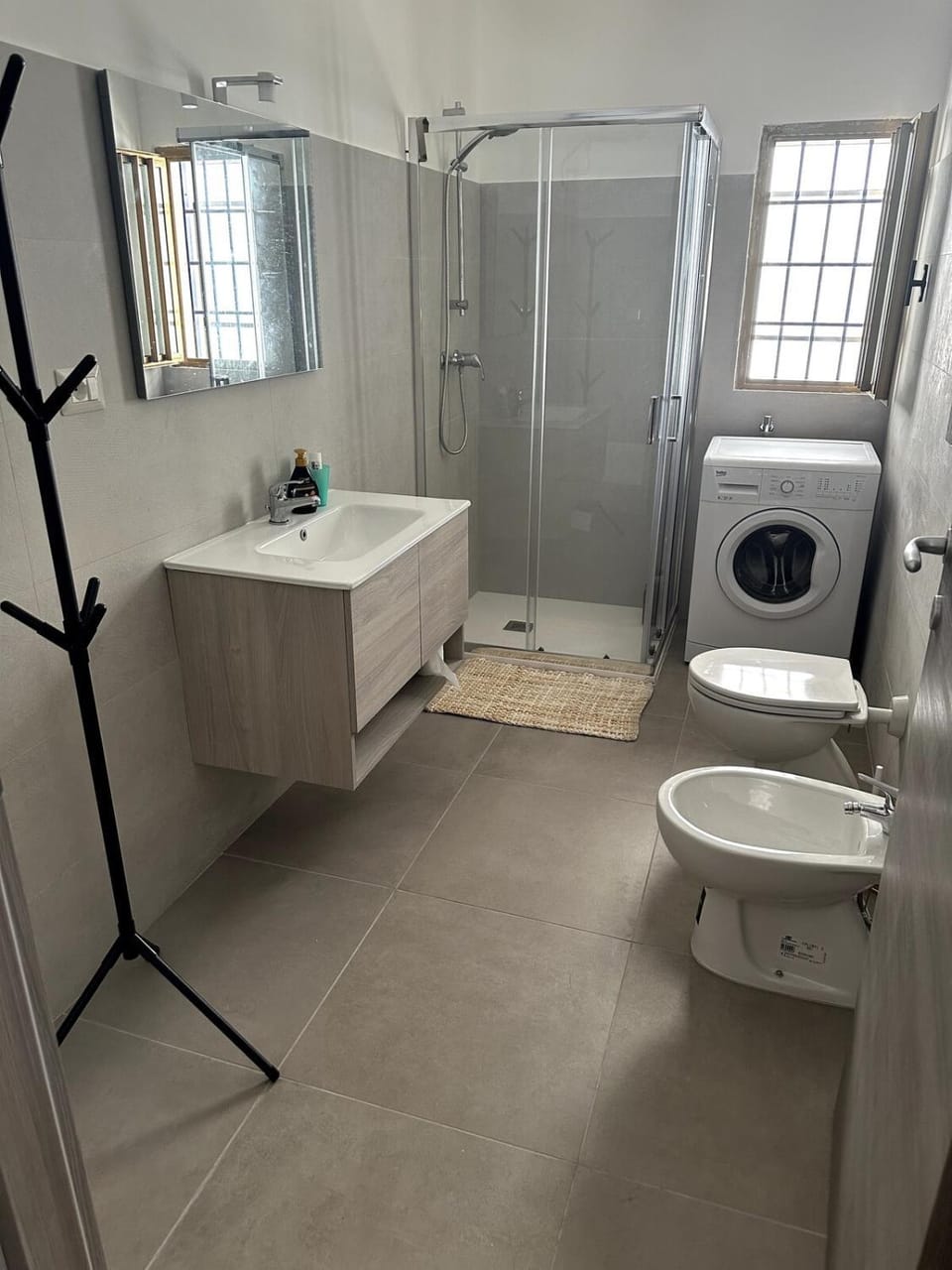 Shower, Toilet, Bathroom, bidet, towels, washing machine