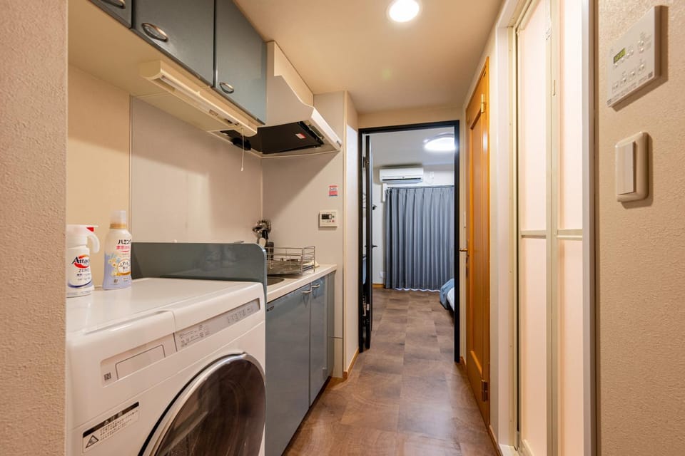 Kitchen or kitchenette, washing machine