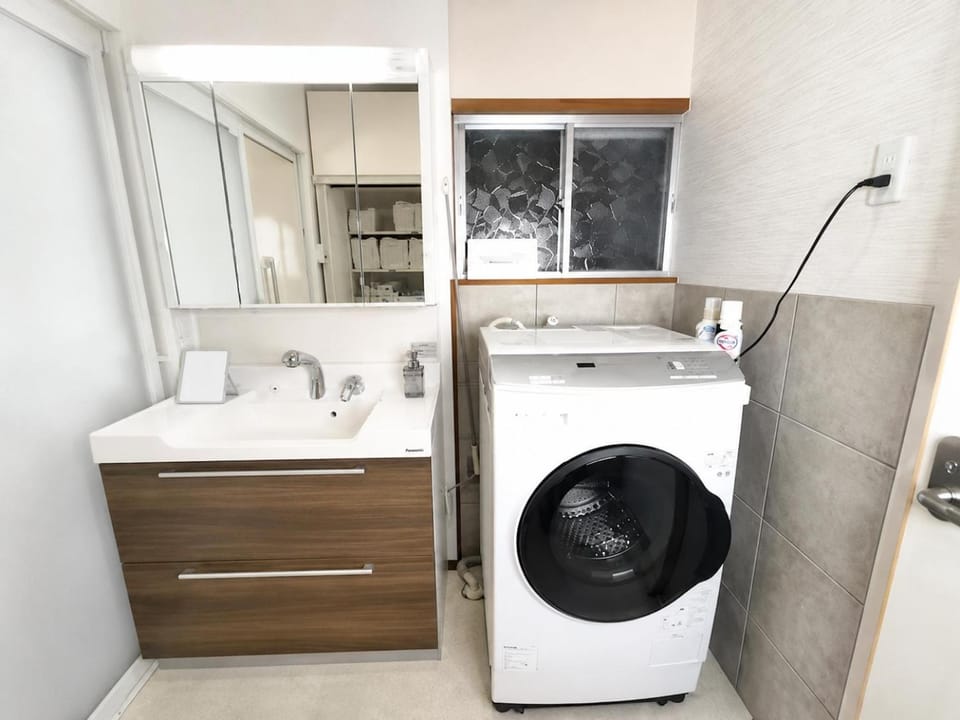 Bathroom, towels, washing machine, dryer