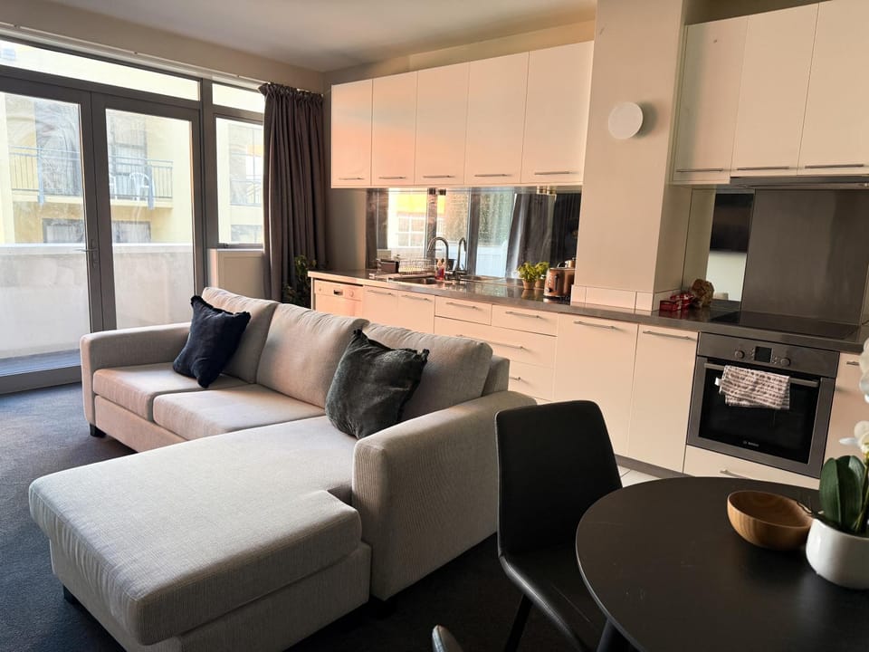 Kitchen or kitchenette, Living room, Seating area, Dining area, dishwasher, oven, stove, toaster