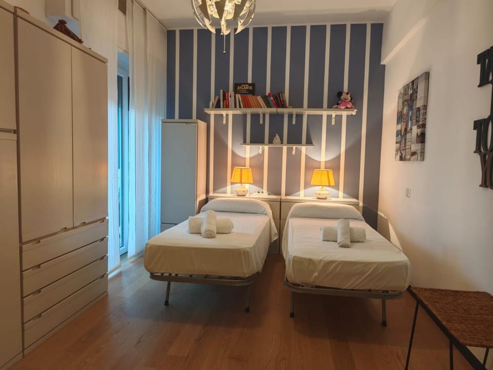Bed, Photo of the whole room, towels, wardrobe