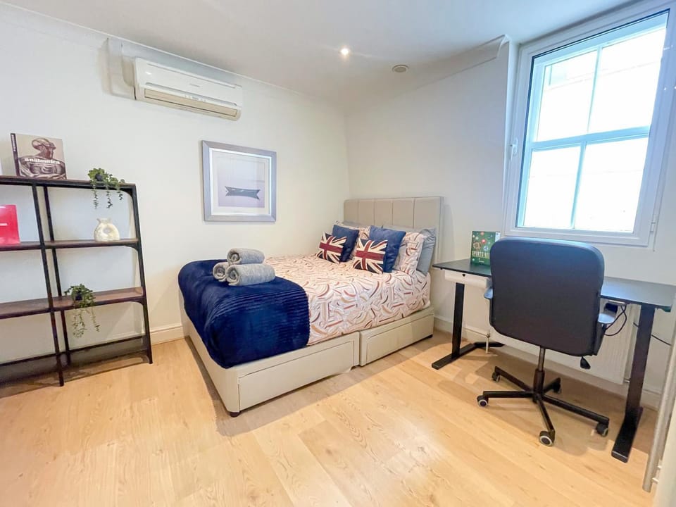 Bed, Decorative detail, Seating area, Bedroom, flat iron, hair dryier, heating, storage, towels, wardrobe, air conditioner