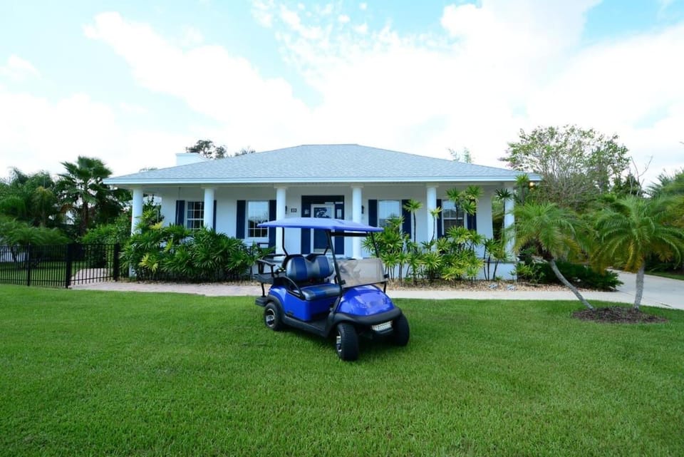 Romantic Beach Home with Heated Pool Golf Cart House in Palm Coast