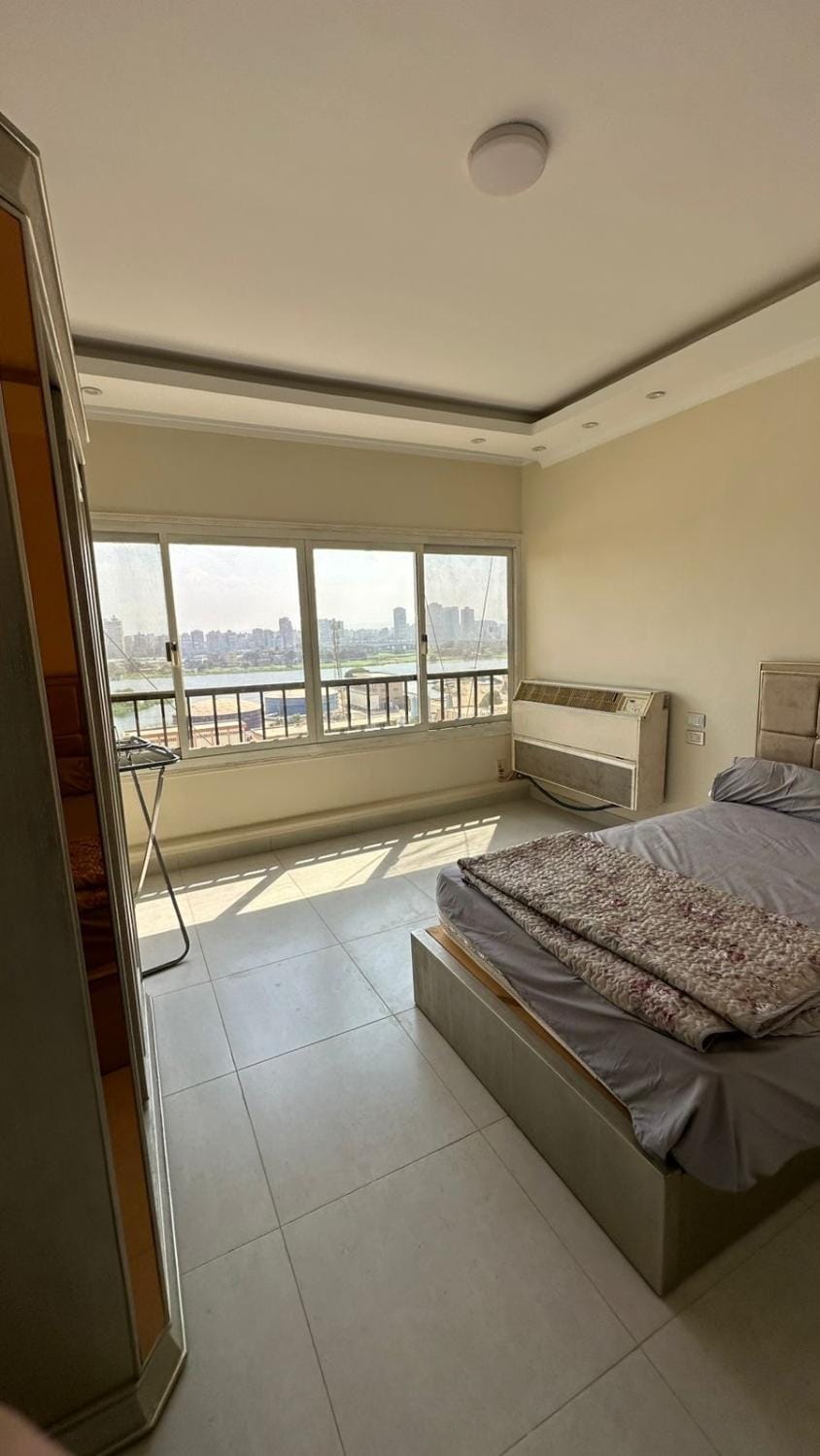 شقة بإطلالة بانورامية علي النيل Apartment in Cairo Governorate
