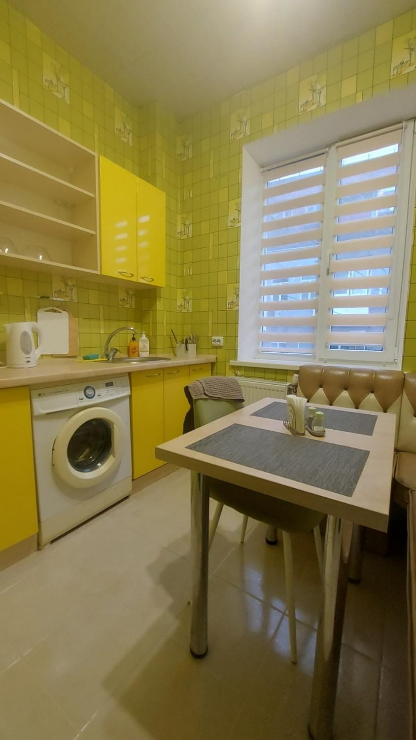 Kitchen or kitchenette, Dining area, stove, washing machine