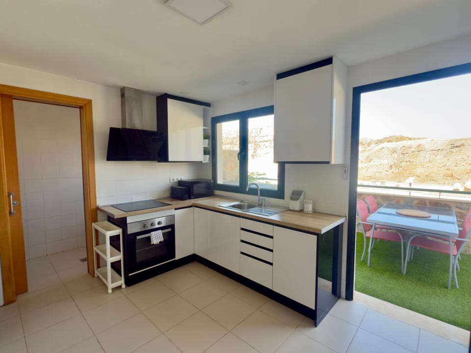 Kitchen or kitchenette, oven, stove