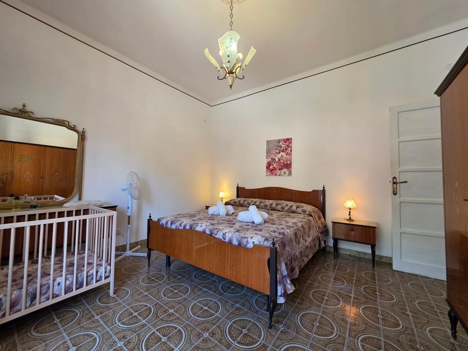 Bed, Bedroom, cot, towels, wardrobe