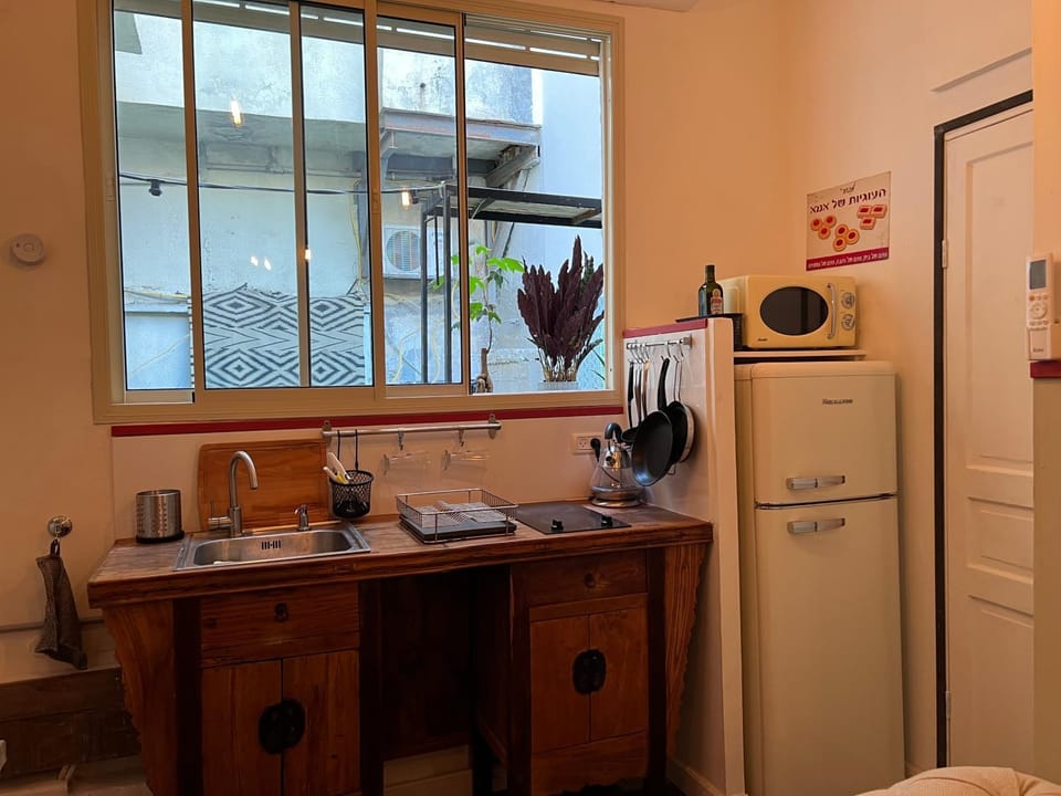 Kitchen or kitchenette, stove, toaster
