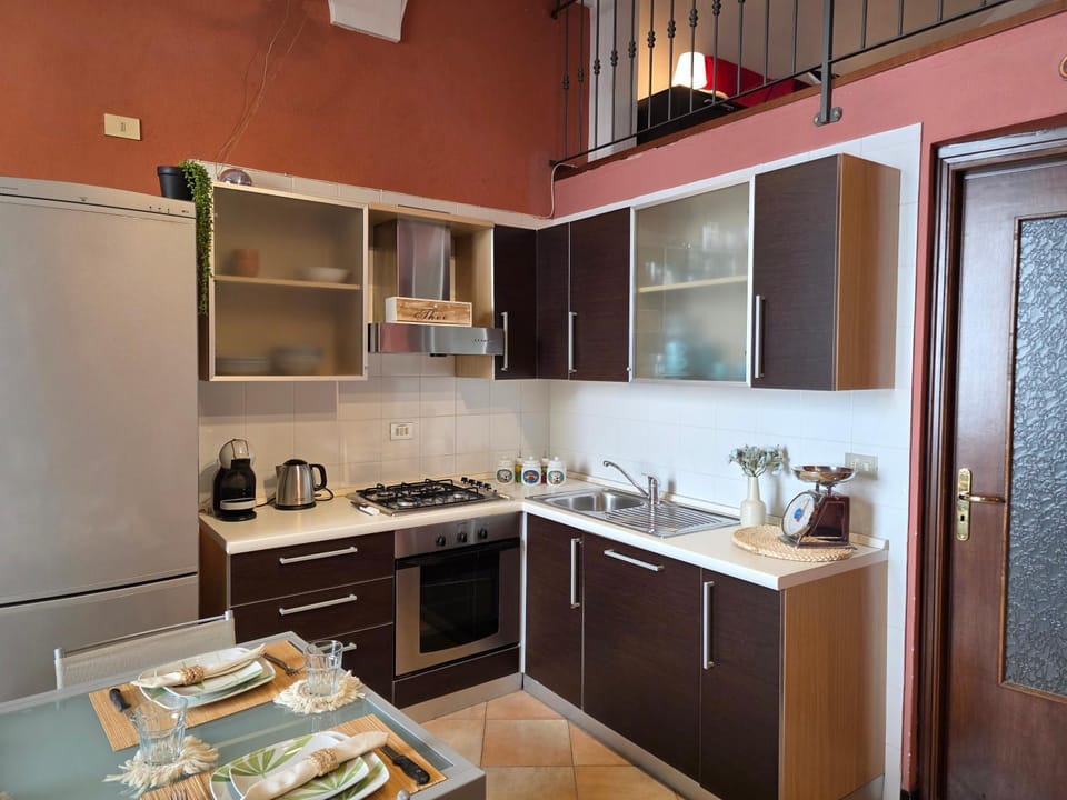 Kitchen or kitchenette, oven, stove