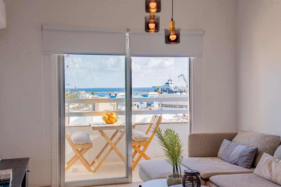 View (from property/room), Balcony/Terrace, Living room, Seating area, Sea view
