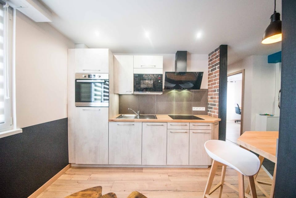 Kitchen or kitchenette, oven, stove