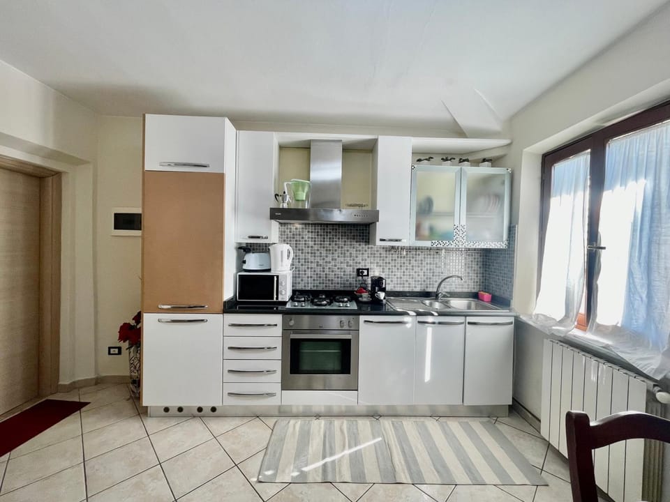 Kitchen or kitchenette, stove, toaster, kitchen