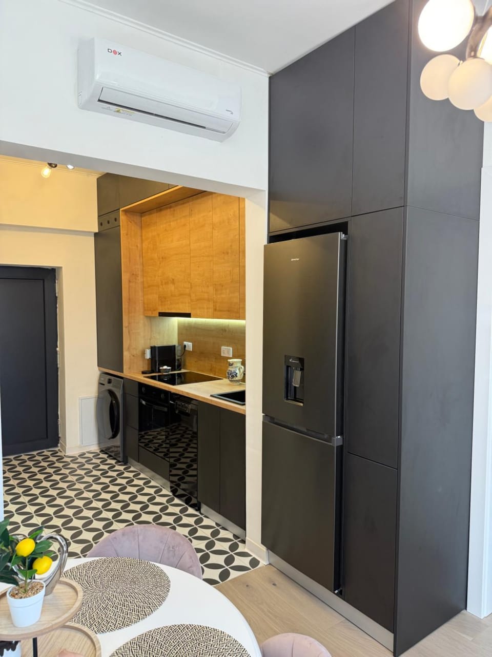 Kitchen or kitchenette, oven, air conditioner