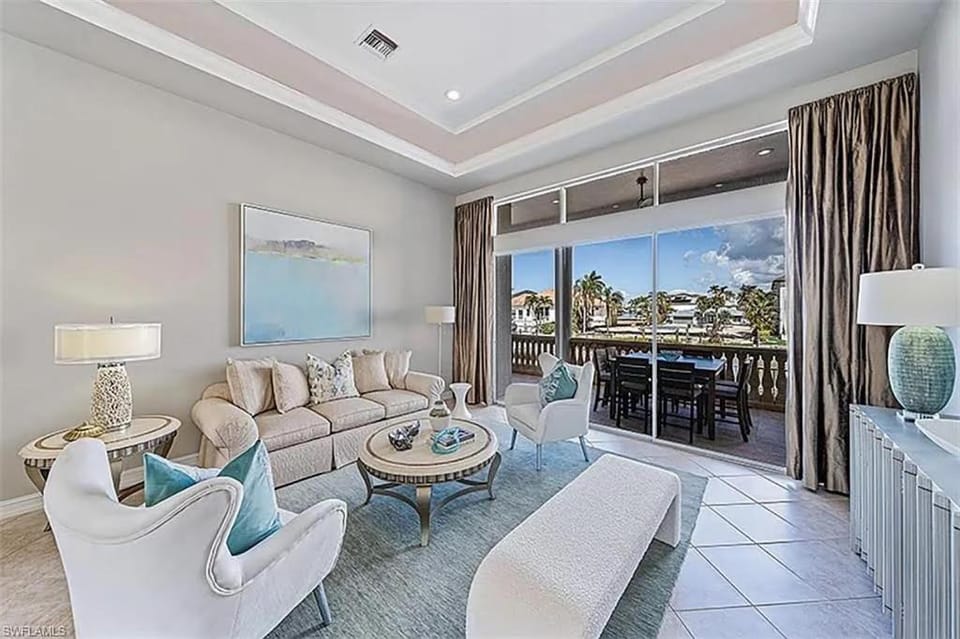 Waterfront Retreat! Breathtaking Water Views - Sparkling Pool & Dock - Walk to the Beach! House in Vanderbilt Beach