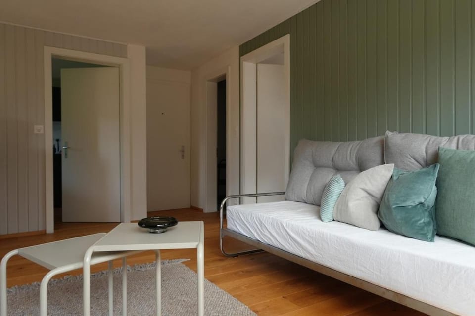 Bed, Living room, Seating area