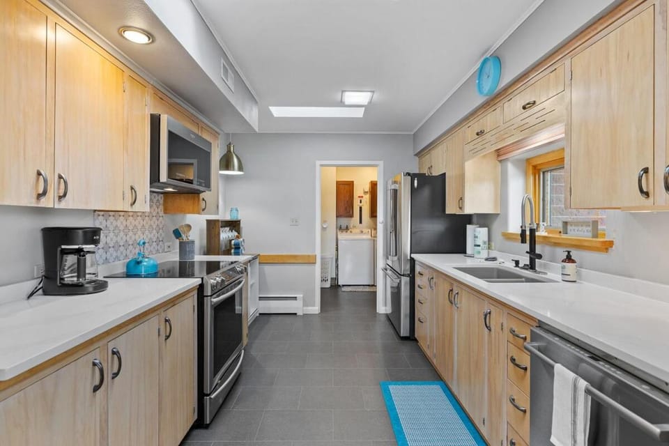 Kitchen or kitchenette, dishwasher, oven, stove, toaster