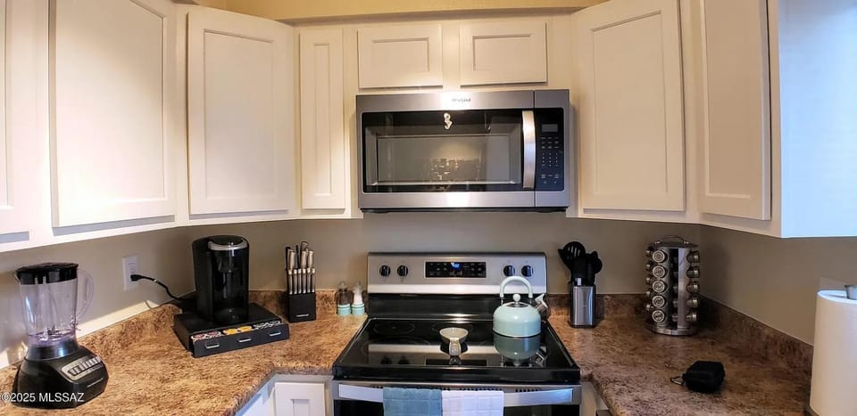 Kitchen or kitchenette, oven, stove