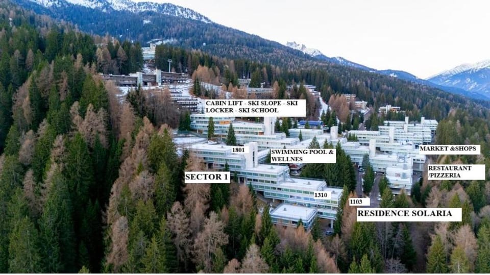 Nearby landmark, Natural landscape, Text overlay, Mountain view