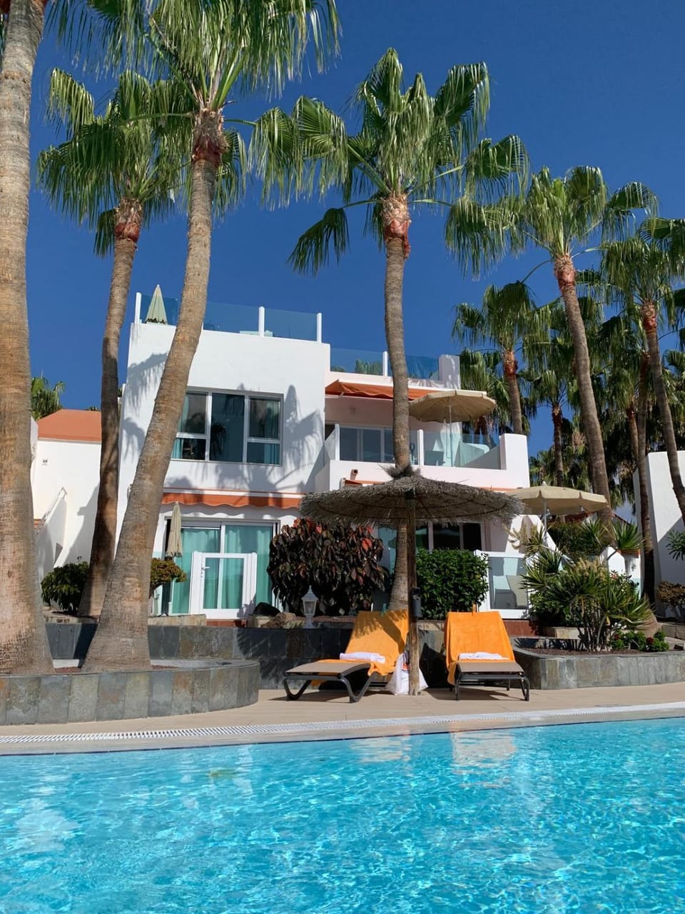 Property building, Pool view, Swimming pool, sunbed