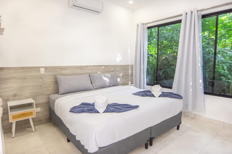 Bed, Bedroom, Garden view, air conditioner