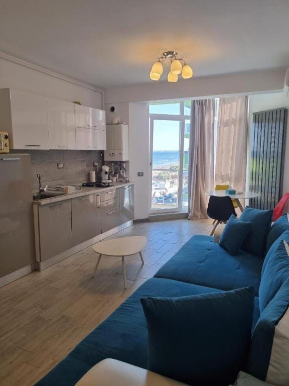 Kitchen or kitchenette, Living room, Seating area, Dining area