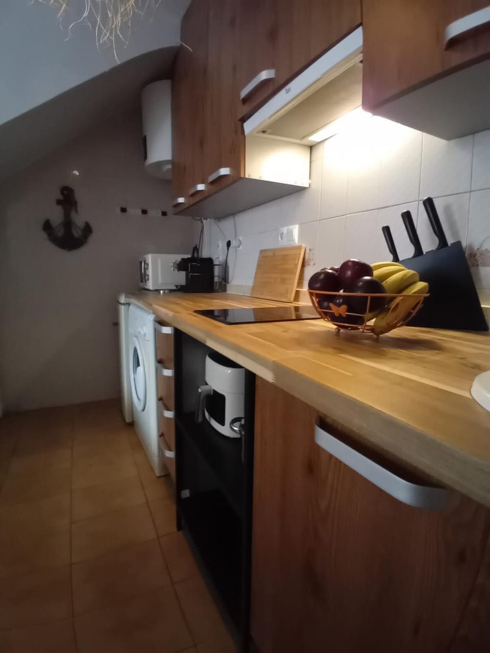 Kitchen or kitchenette, stove