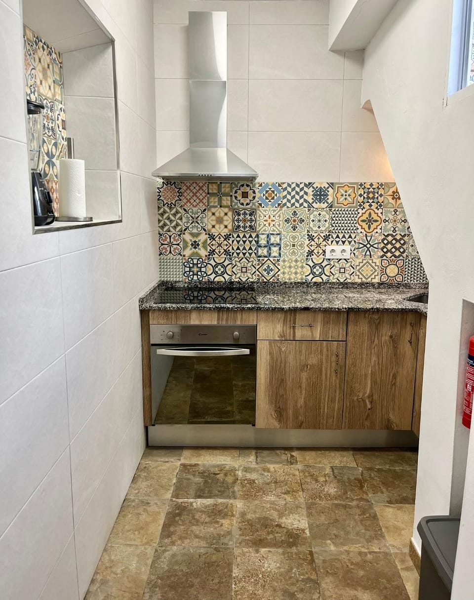 Kitchen or kitchenette, oven, stove