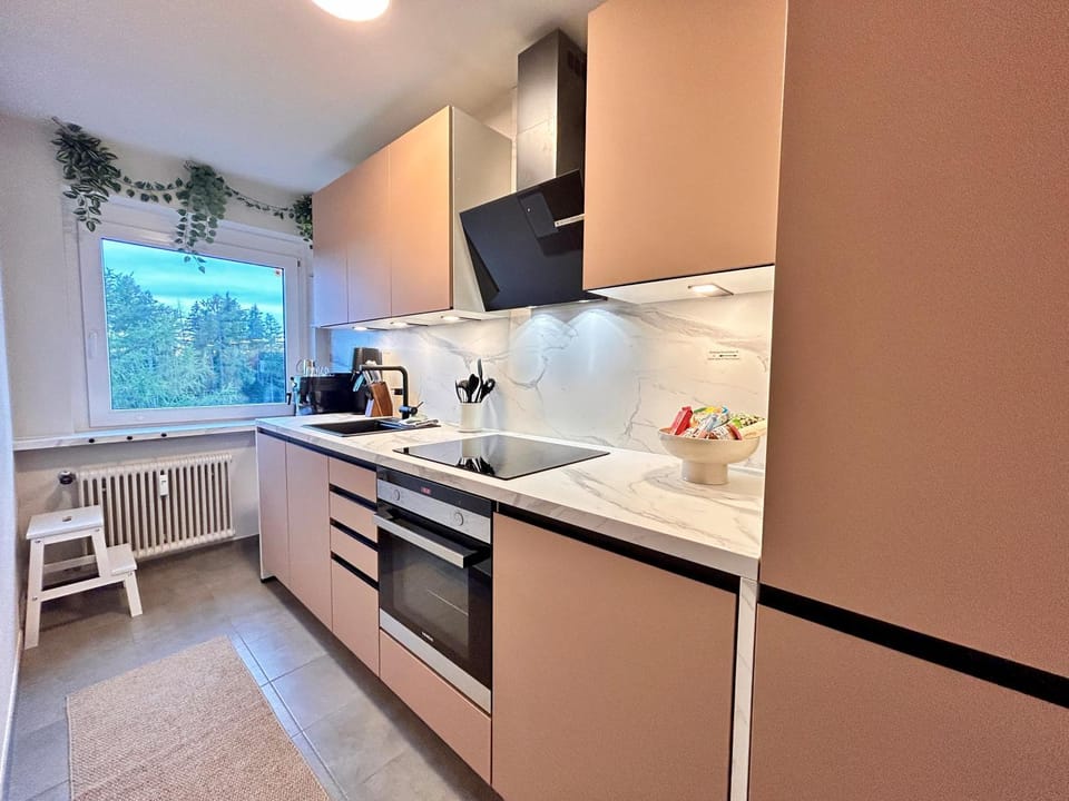 Kitchen or kitchenette, dishwasher, oven, stove, toaster