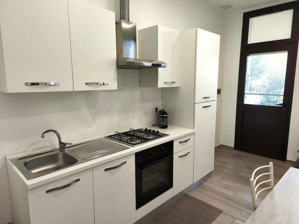 Kitchen or kitchenette, oven, stove