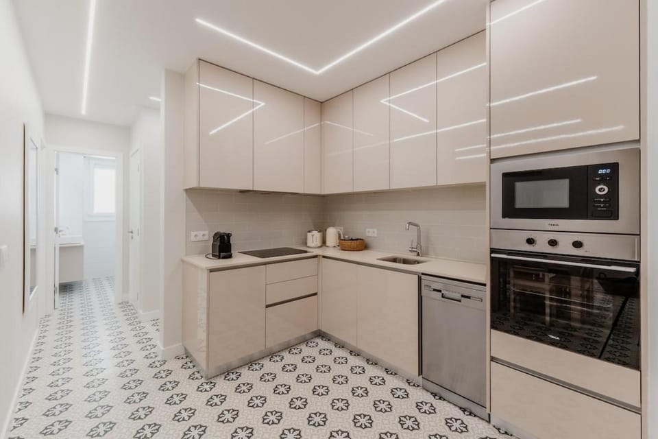 Kitchen or kitchenette, dishwasher, oven, stove, toaster