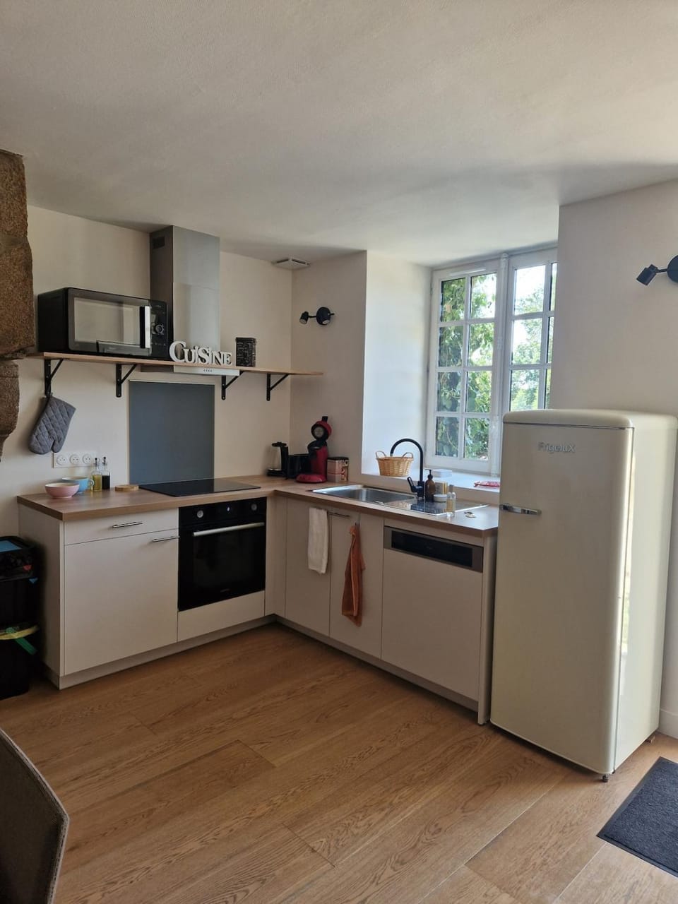 Kitchen or kitchenette, dishwasher, oven, stove, toaster