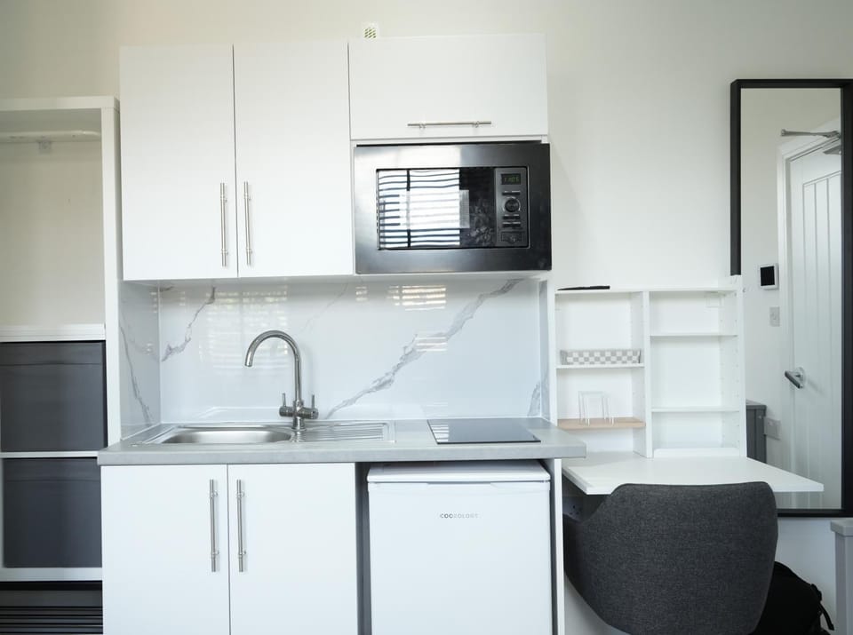Kitchen or kitchenette, stove