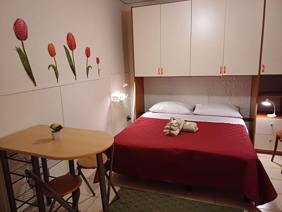Dining area, Bedroom, towels, wardrobe