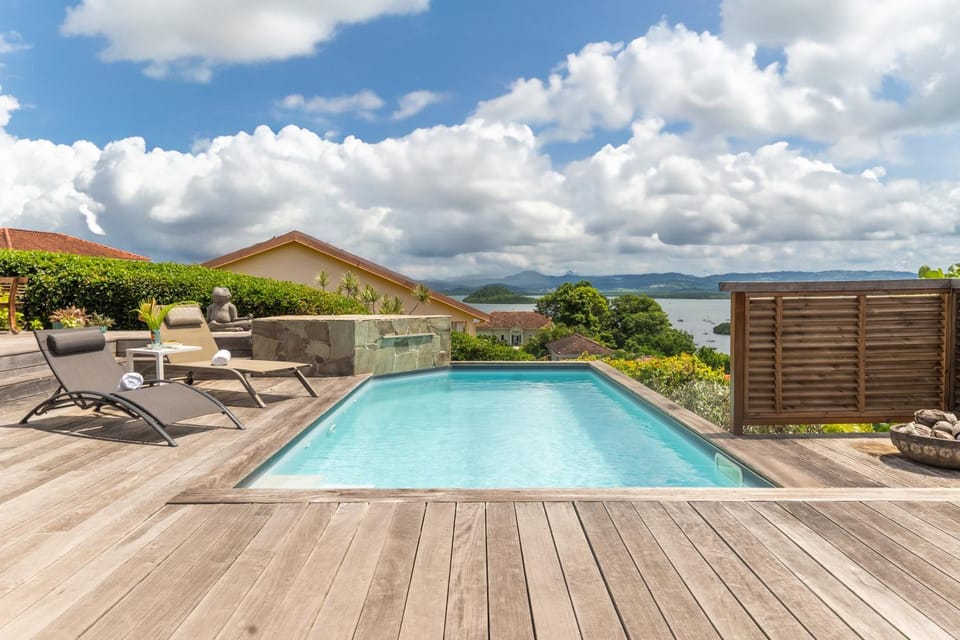 Nearby landmark, Day, Natural landscape, Pool view, Sea view, Swimming pool, sunbed