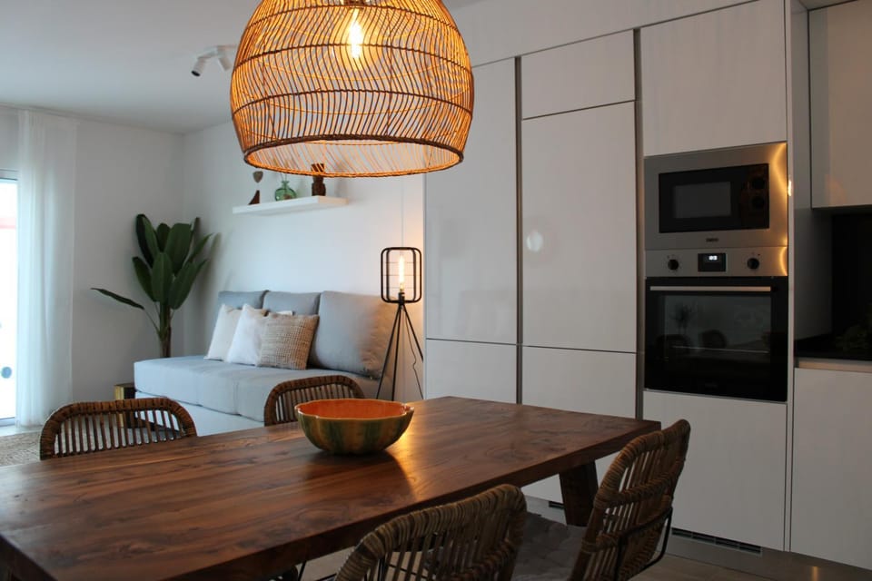 Bed, Living room, Seating area, Dining area