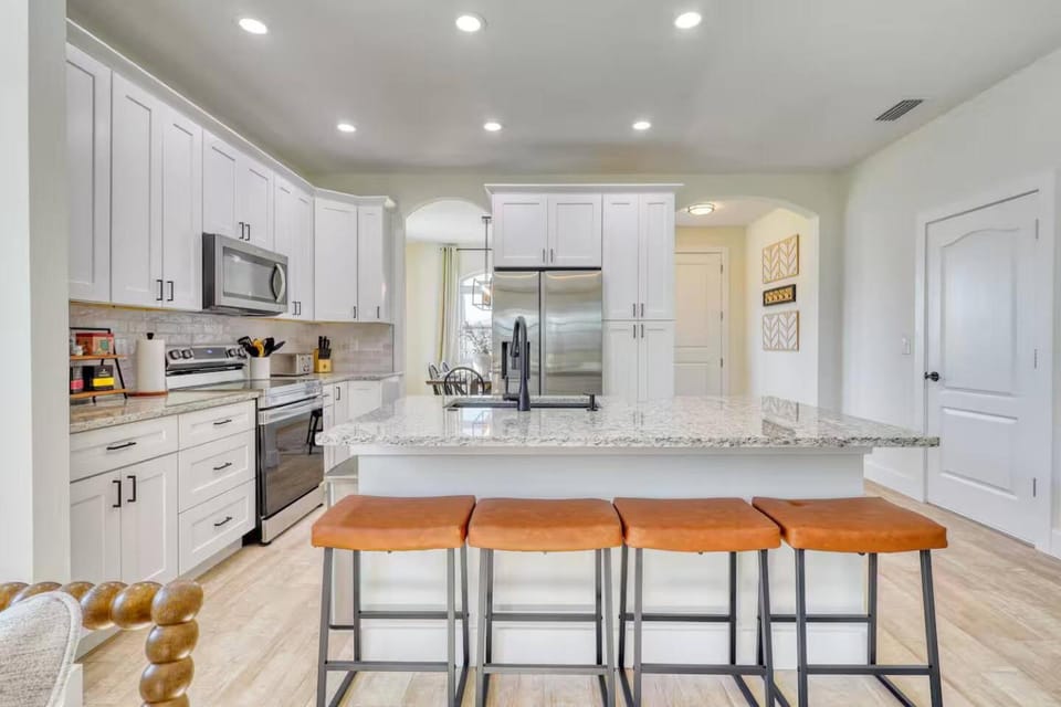 Kitchen or kitchenette, dishwasher, oven, storage