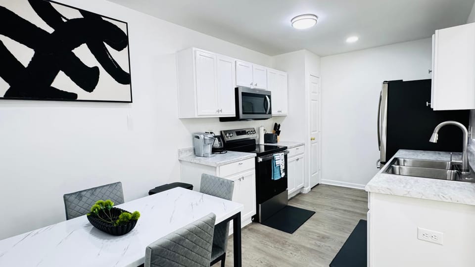 Kitchen or kitchenette, Dining area, dishwasher, oven, stove, toaster