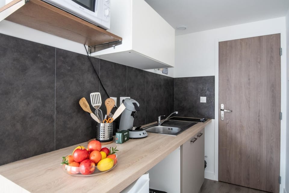 Kitchen or kitchenette, stove