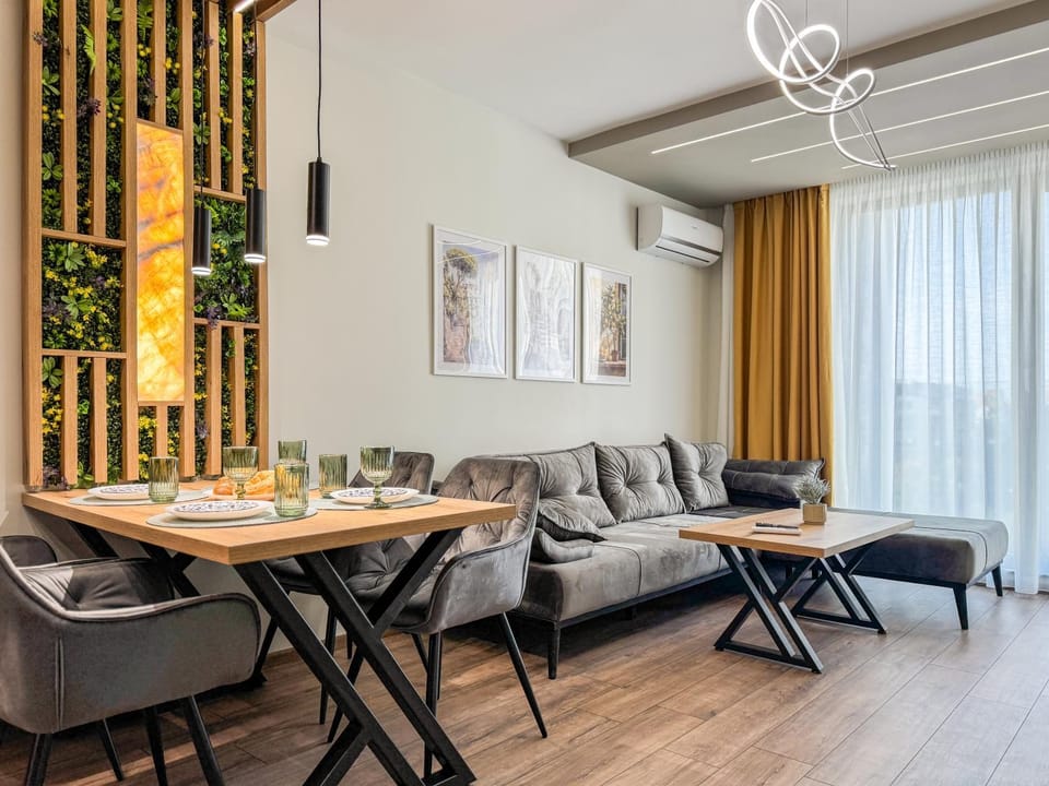 View (from property/room), Living room, Decorative detail, Seating area, Dining area, internet, air conditioner