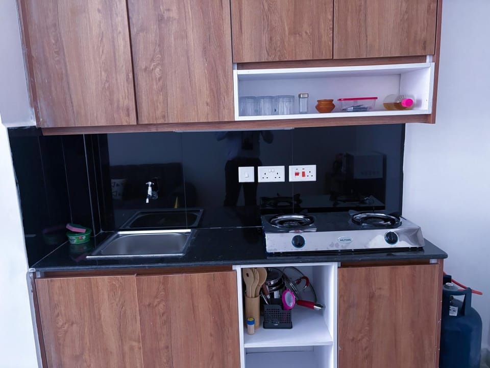Kitchen or kitchenette, stove